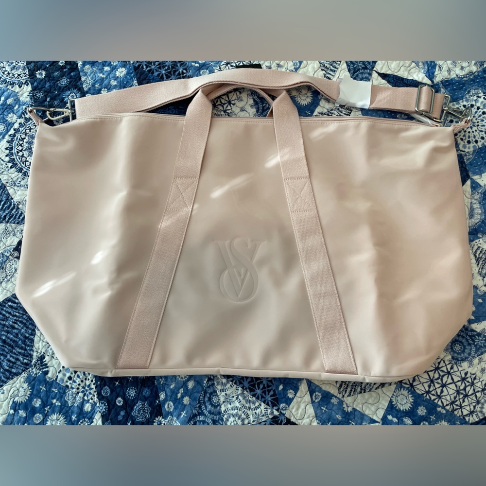 Victoria's Secret shinny blush duffle bag